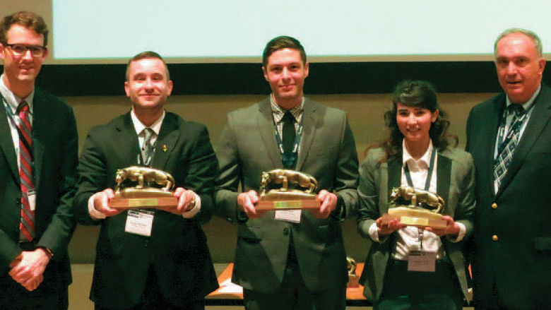 Penn State Behrend won the Case Competition at the NOBE Conference. Students are pictured with their awards, from left, Joseph Helbling, Mechanical Engineering; Matt Nicol, Project and Supply Chain Management; and Amanda Sayko, Industrial Engineering. The students are flanked by NOBE National president, Andrew Quinn, left, and Gary R. Smith, lecturer in management.