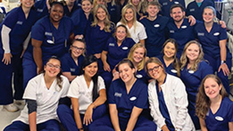 The COVID-19 pandemic upended a lot of traditional learning methods and disrupted hands-on opportunities, but perhaps no group of students at Behrend was in a more unusual position than upper-level Nursing students, like this group who were photographed in a nursing lab at Behrend before the pandemic.