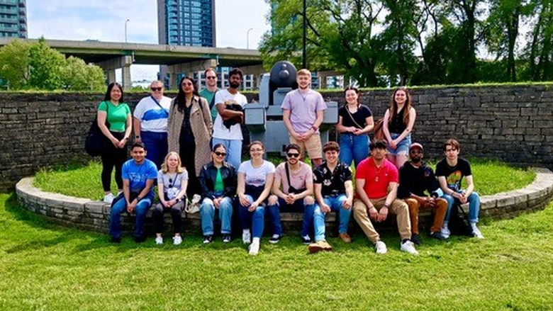 Penn State and Toronto Metropolitan Students with a Fort York cannon.