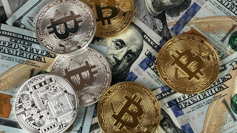 photo of Bitcoin and US Dollar