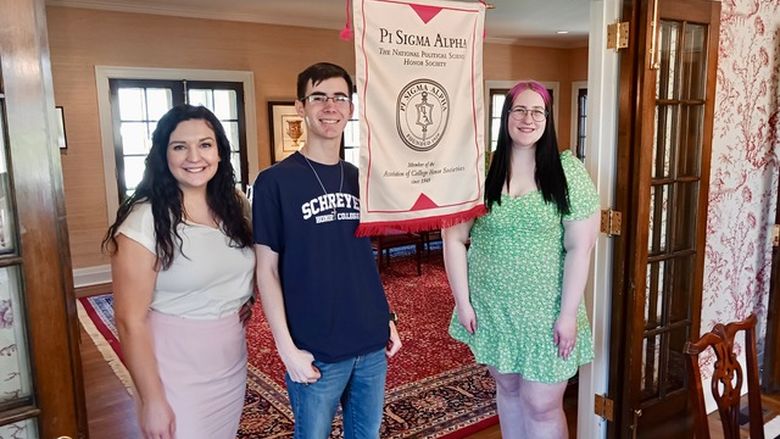 Pi Sigma Alpha members Ashley Solo, Mason Milliard, and Mallory Flesik