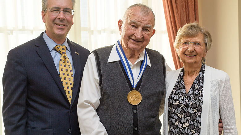 In 2021, Joe and Isabel Prischak were recipients of the college’s highest award, the Behrend Medallion, presented by Penn State Behrend Chancellor Ralph Ford, left.