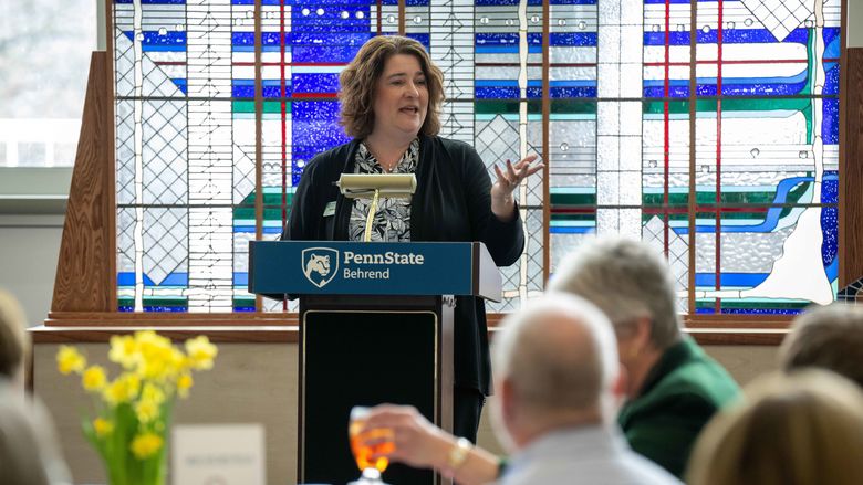 Melanie Ford speaking at the luncheon