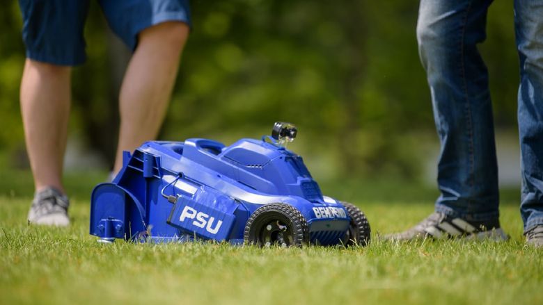 A close-up of a remote-control lawn mower built by students at Penn State Behrend.
