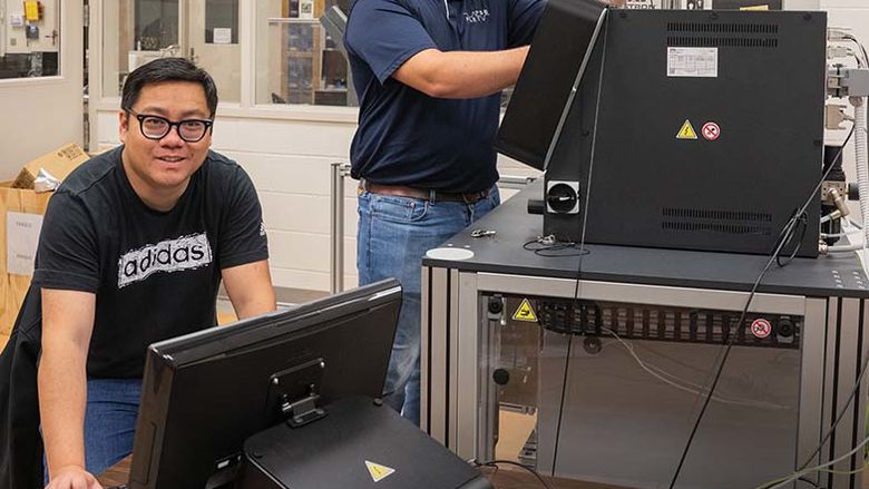 Dr. Xiaoshi Zhang, Plastics Engineering Technology researcher, and Josh Lutz ’21, PLET lab assistant.