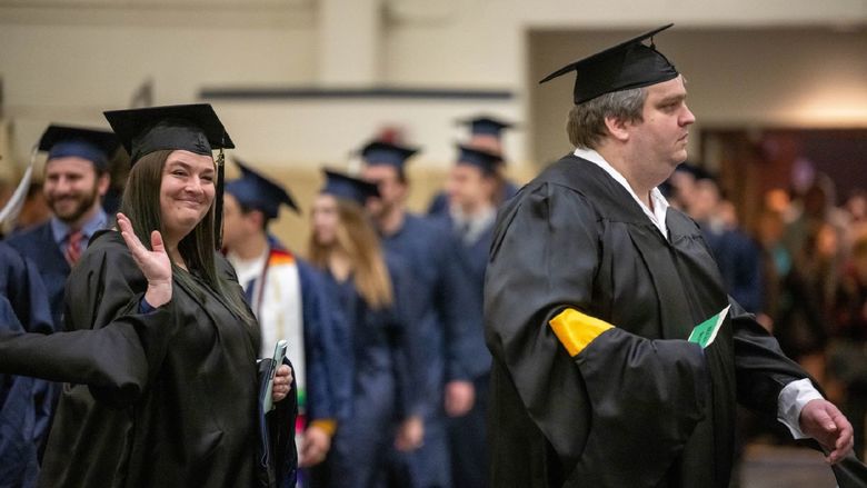 New graduates enter Junker Center at the start of Penn State Behrend's fall 2022 commencement.