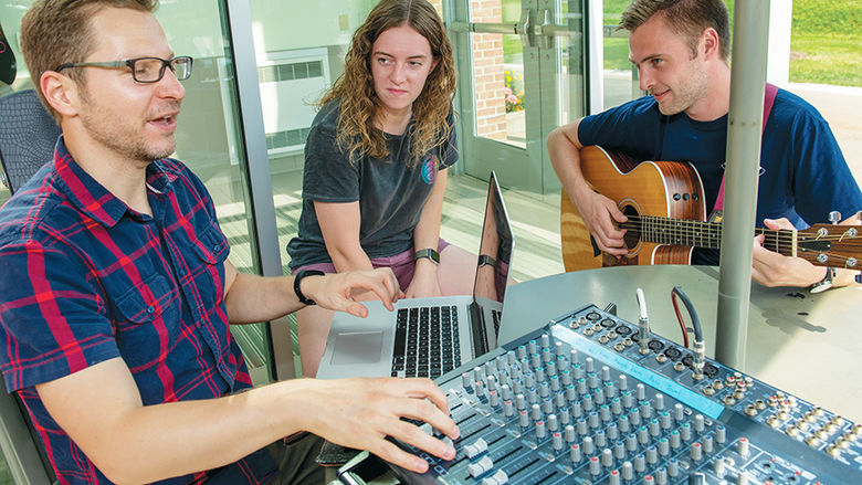 A Penn State Behrend professor and two students record music for a new praise album.