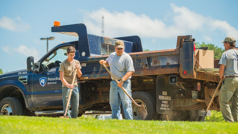 Penn State Behrend Maintenance and Operations staff work outdoors to keep the campus beautiful