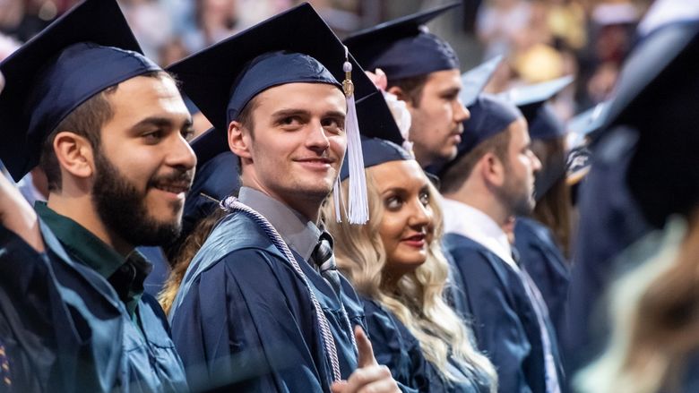 A group photo of graduates at Penn State Berhend's spring commencement ceremony.