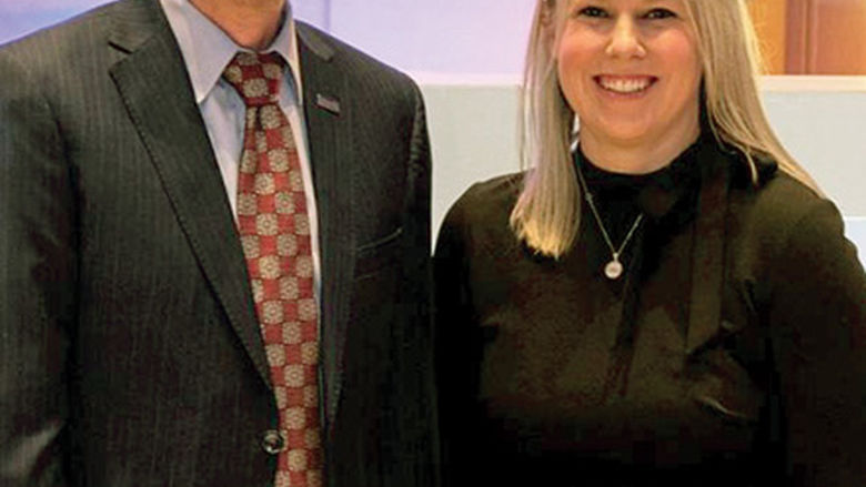 Nicole (Frisbee) Gailey, pictured here with Chancellor Ralph Ford, was recently honored as one of seven Penn State Alumni Achievement Award recipients.
