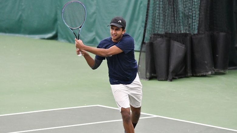 Penn State Behrend tennis player Ritvik Nadikude hits a backhand.