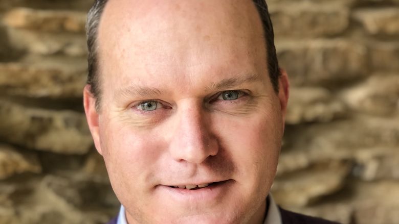 A portrait of Stephen Monroe, assistant dean of the College of Liberal Arts at the University of Mississippi