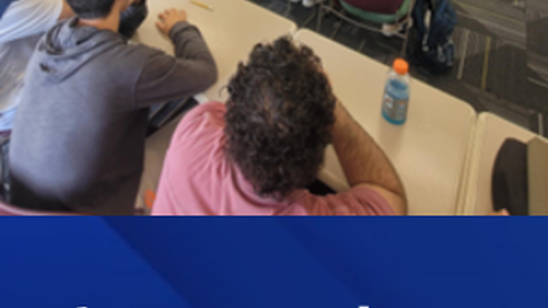 Students and professionals in a classroom
