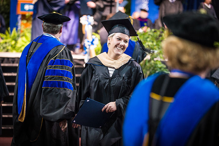 Master's degree graduate at commencement