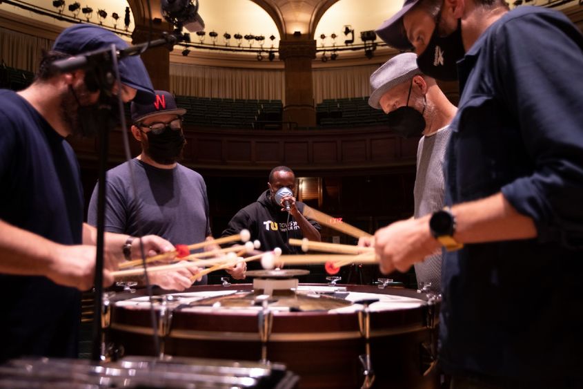 Dominic Shodekeh Talifero, at center, beatboxes with the ensemble So Percussion