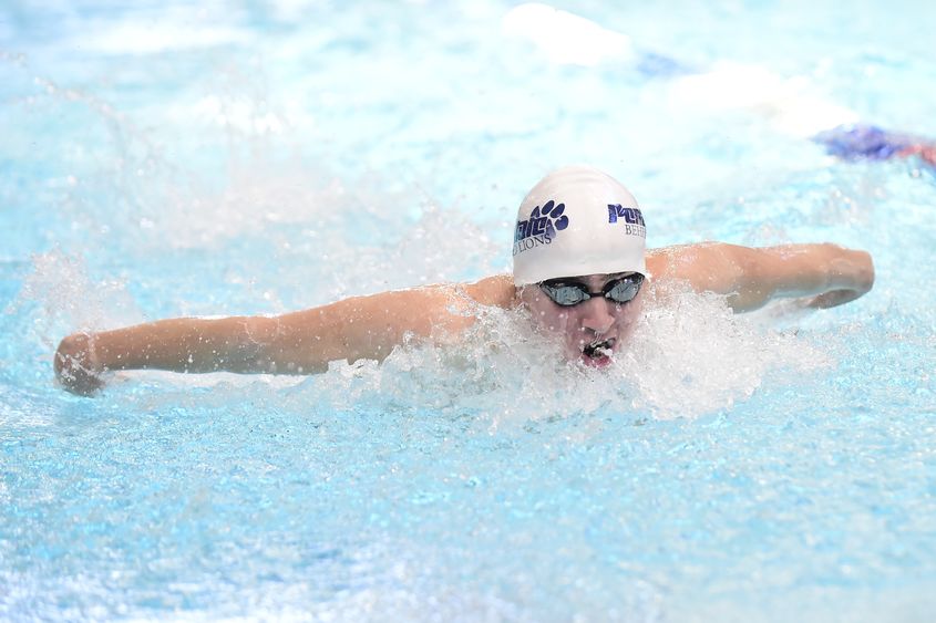 Penn State Behrend swimmer Liam Watterson swims in a race.