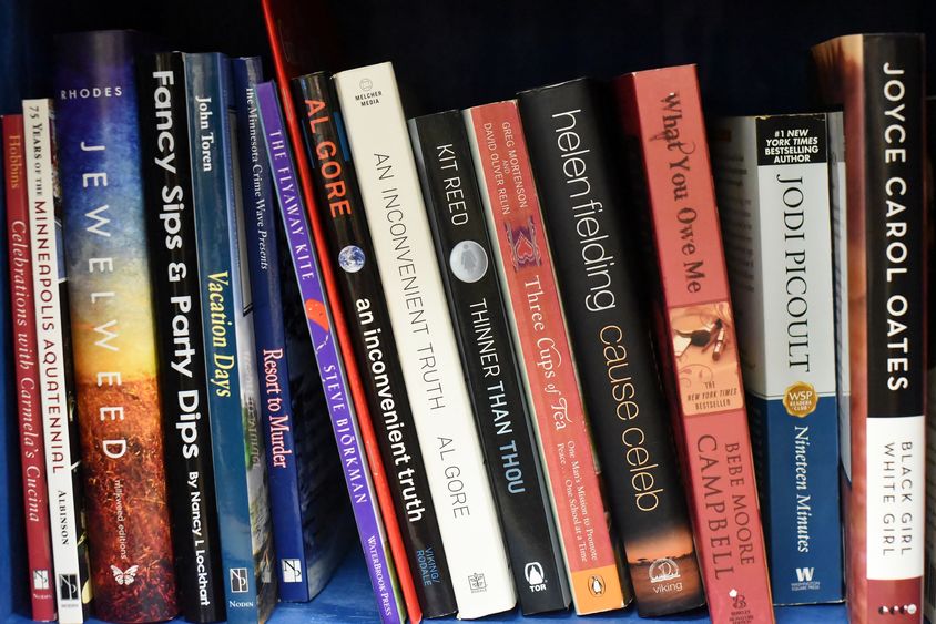 A selection of books on a shelf at Penn State Behrend