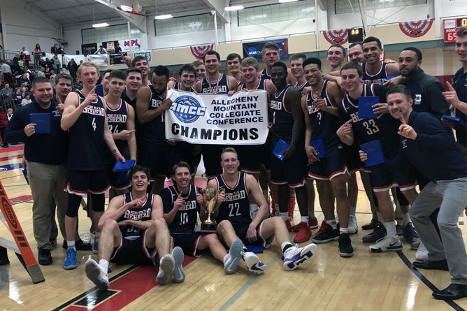 The Penn State Behrend men's basketball team celebrates its 2019 AMCC championship victory.