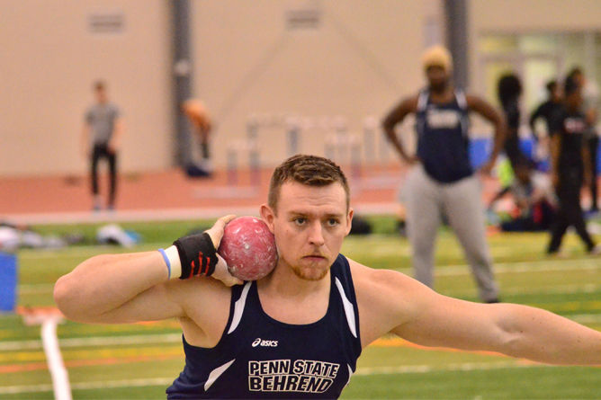 Penn State Behrend track and field athlete Mitchell Obenrader prepares to throw the shot put.