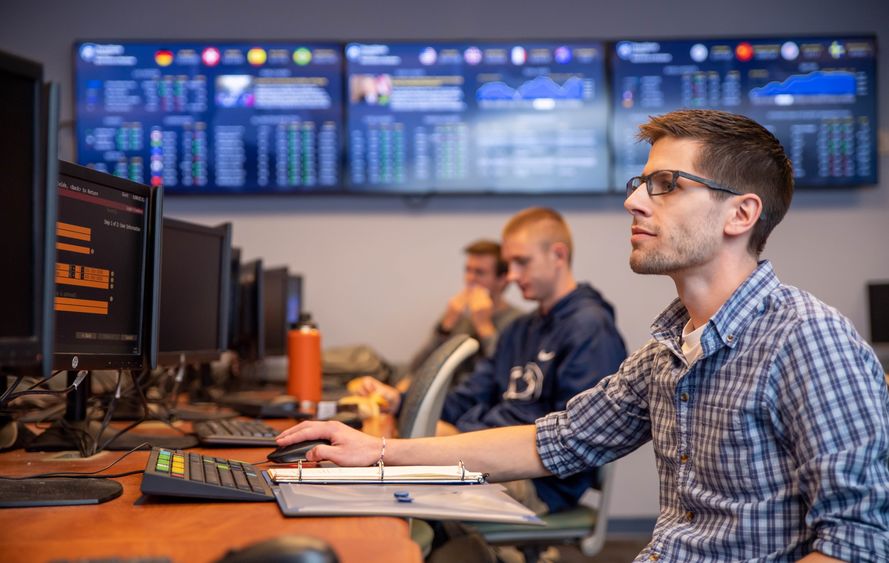 Students work on Bloomberg Terminals in the Penn State Behrend finance lab