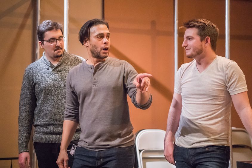 Wilson Jermaine Heredia, center, coaches students Logan Saborsky, left, and Jaret Kelly during a visit to Penn State Behrend's Studio Theatre last month. 