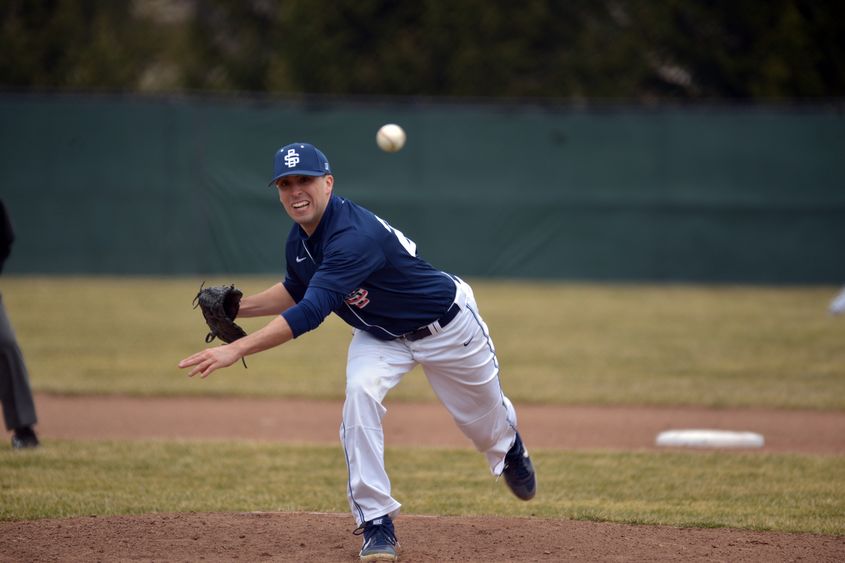 Penn State Behrend baseball player Phil Myers pitches during a game.