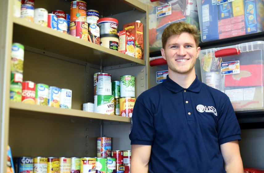 A portrait of AmeriCorps VISTA member Rob Felger in the Penn State Behrend Lion's Pantry.