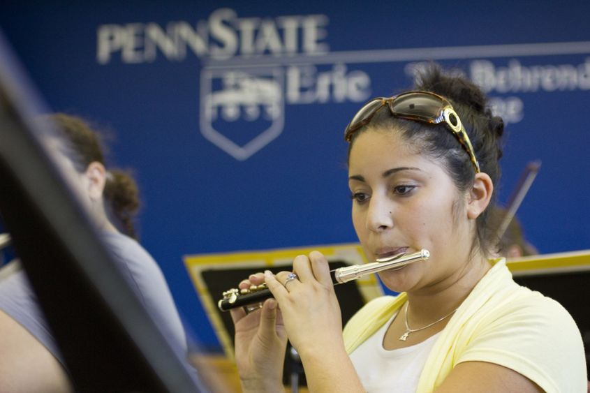 A student musician rehearses with the Penn State Behrend Concert Band.