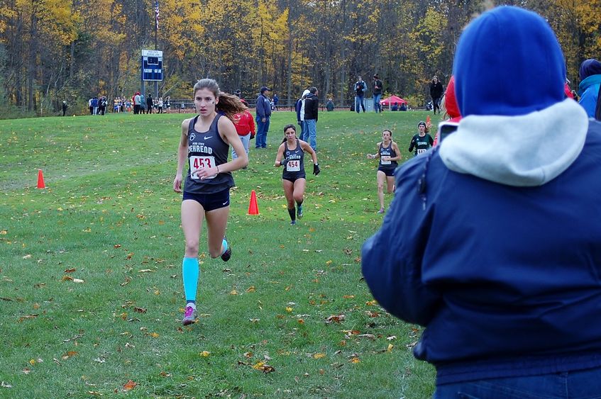 Penn State Behrend cross country runner Savanna Carr competes in a race.