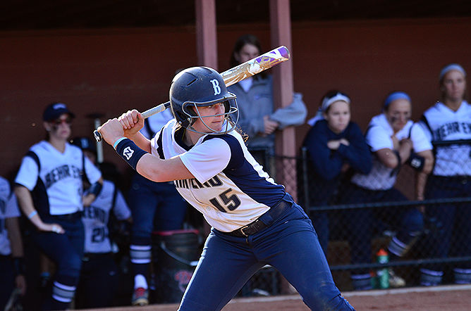 A Penn State Behrend softball player waits for a pitch.