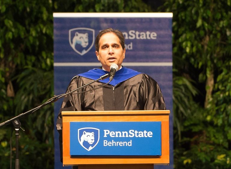 Ashutosh Deshmukh speaks during a Penn State Behrend commencement program.
