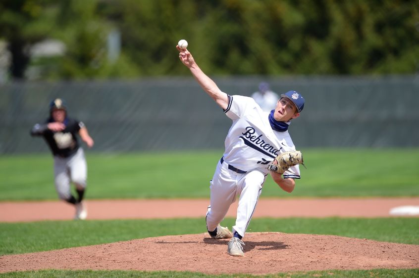 A Penn State Behrend pitcher throws the ball.