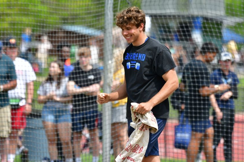 Track-and-field athlete Dan Dabrowski celebrates after a discus throw.