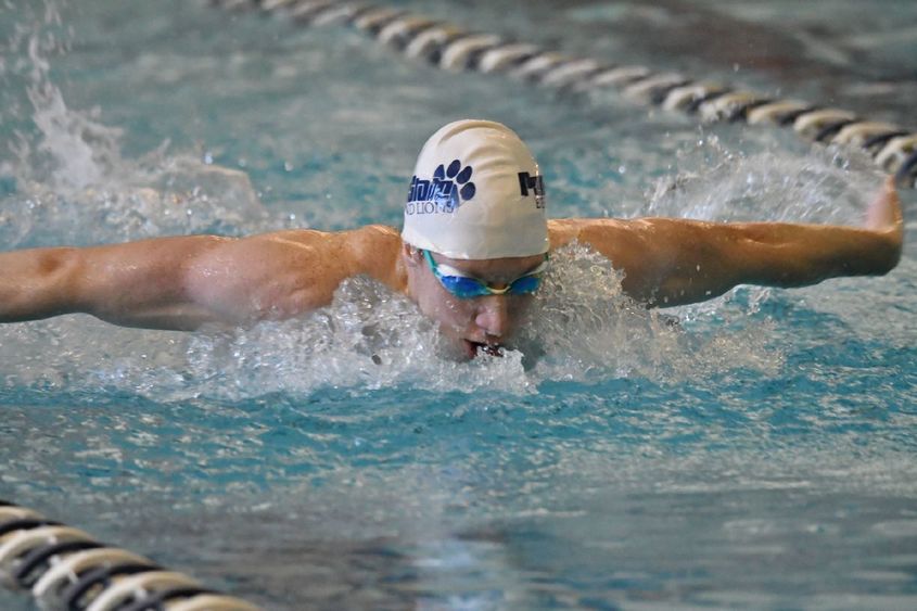 Penn State Behrend swimmer Tim Compton competes in a fly event.