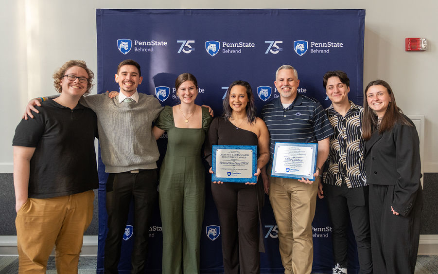 Members of Behrend Benefiting THON post with awards at the Excellence in Leadership and Service Awards at Penn State Behrend.