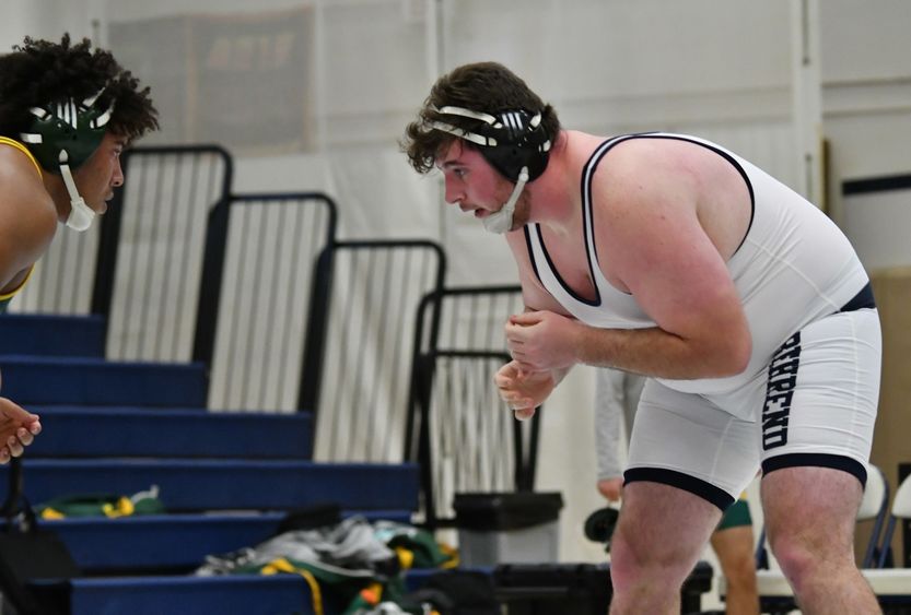 Penn State Behrend wrestler Joe Newara faces an opponent.