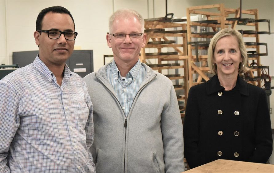 Members of a new Kaizen organizational team pose in the materials lab at Penn State Behrend.