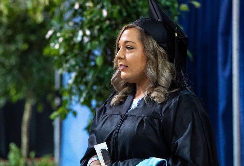 A Penn State Behrend graduate at commencement.