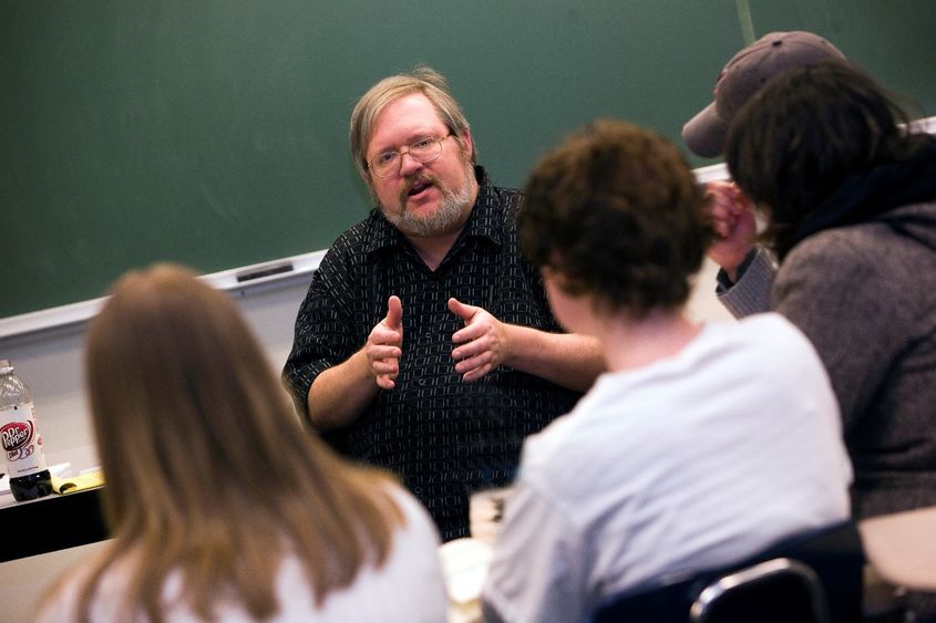 Penn State Behrend faculty member George Looney leads a class.