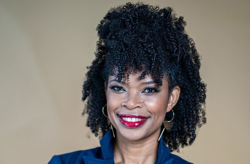 A portrait of Martina Edwards, the first Black woman to hold a seat at the New York Stock Exchange.