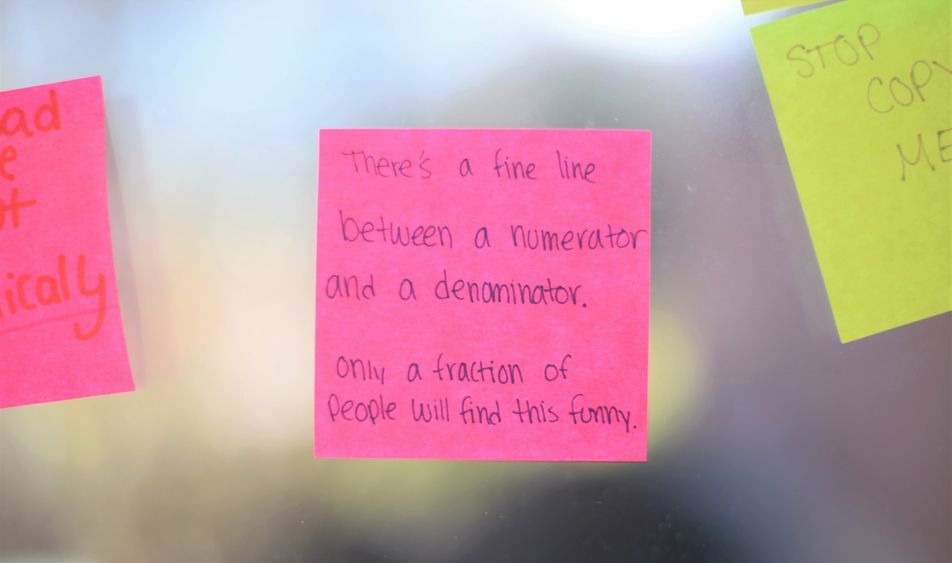 A Post-it Note in a breezeway at Penn State Behrend.