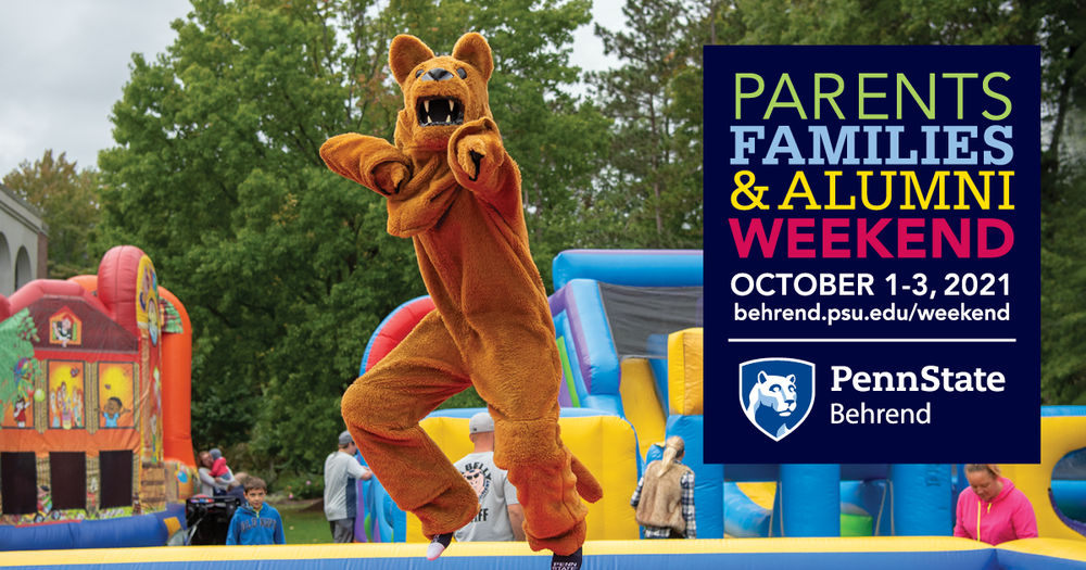 The Nittany Lion jumps on an inflatable during an event at Penn State Behrend.