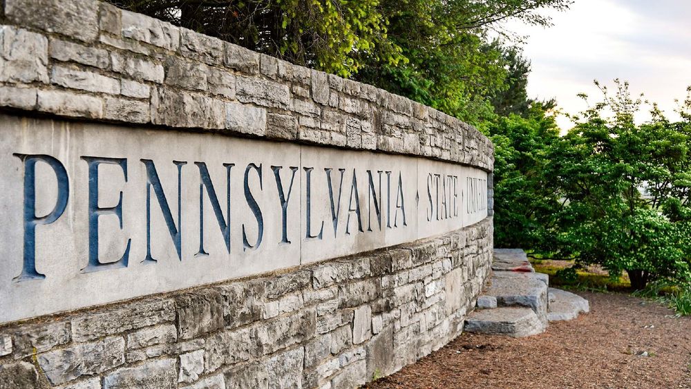 The words 'Pennsylvania State University' are shown on a stone wall.