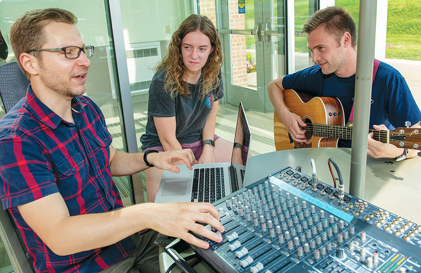 A Penn State Behrend professor and two students record music for a new praise album.