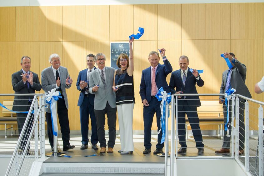 Behrend Chancellor Ralph Ford and other partners cut the ribbon to open the new translational research lab at Penn State Behrend.