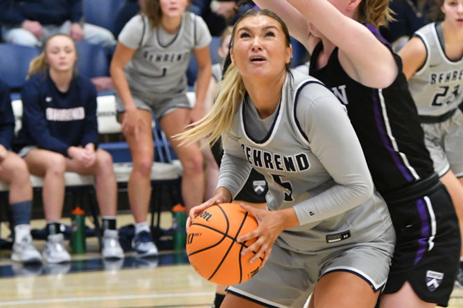 Penn State Behrend basketball player Rachel Majewski prepares to take a shot.