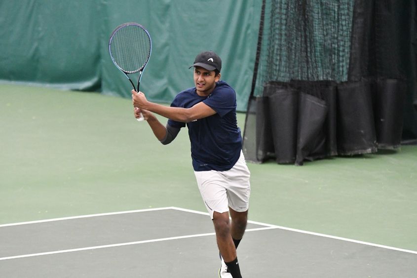 Penn State Behrend tennis player Ritvik Nadikude hits a backhand.