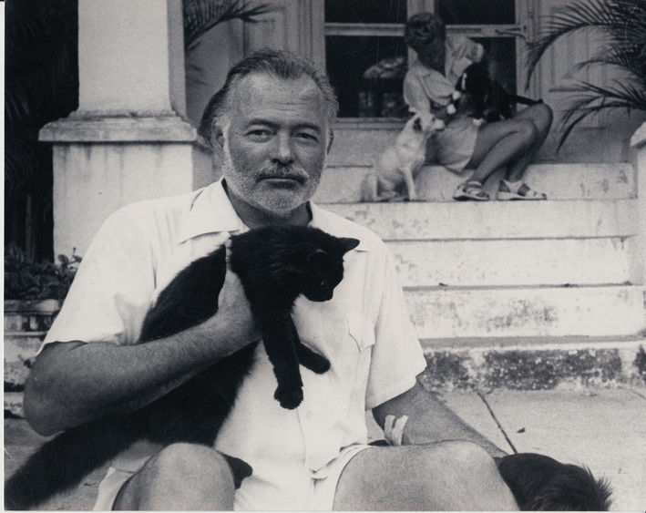 Ernest Hemingway Ernest Hemingway holding a cat.