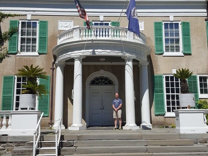 Steven Miller stands on the front steps of the Hyde Park home of former President Franklin Delano Roosevelt