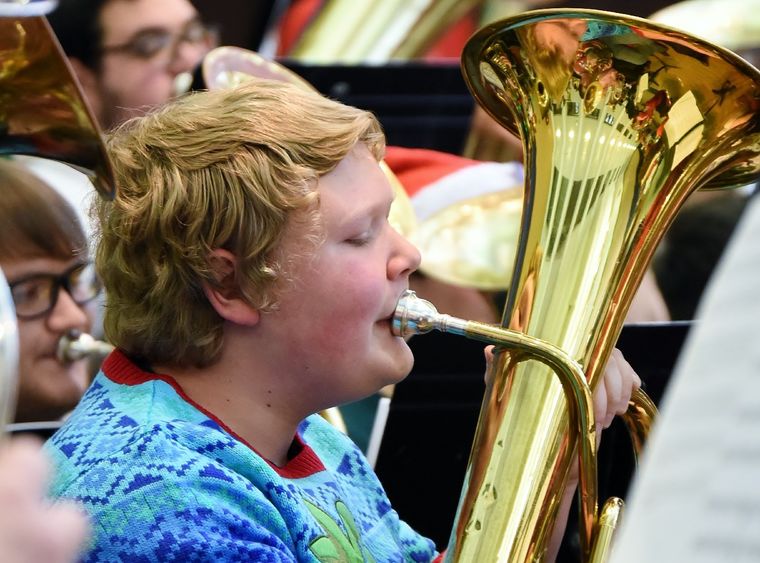 A tuba player performs during a Christmas concert at Penn State Behrend.